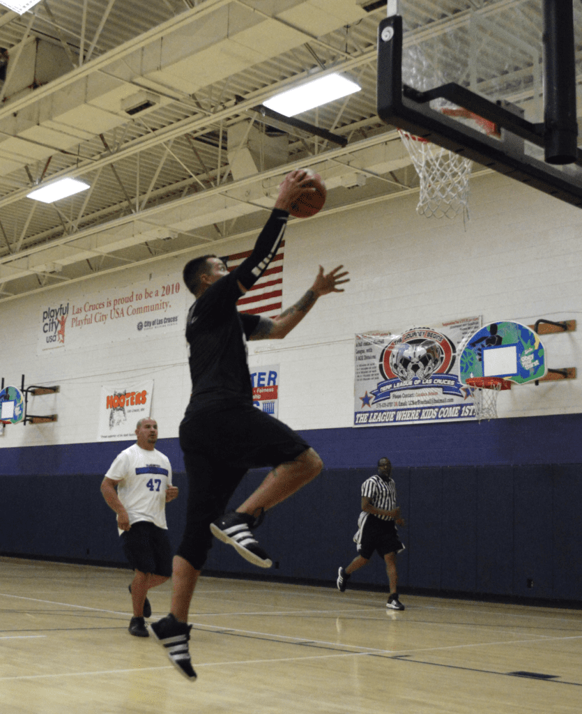 Men playing basketball